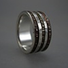 copper and silver ring channel ring