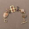 14kt gold, stones:  fossil coral, fossil pine cone, druzy, petersite, orange moonstone, obincular jasper
