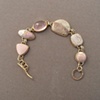 14kt gold, stones:  willow jasper, fossil palmwood, willow jasper, rose quartz, crazy lace jasper, willow jasper
