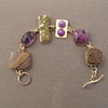 14kt gold, stones:  jasper, amethyst, poppy jasper, sugelite, stitchtite, fossil tree fern  
