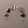 14kt gold, stones: petersite, onyx, tiger iron, garnet, garnet in schist, pyrite in onyx