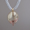 14kt Yellow and White Gold, Stones:  Pink Willow Jasper, Pink Tourmalines,  Pendant part of "Jewelry For The Home" vessel