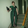 Woman With Crow in Brooklyn Apartment Building
New York