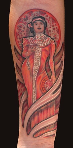 Emily with an Alphonse Mucha tattoo.  