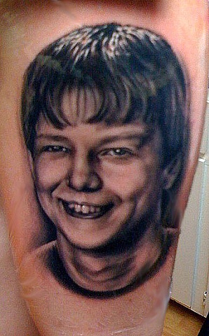 Great portrait tattoo in black and gray