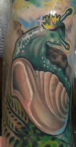 best tattoo client has this illustrative snail foot tattoo is in full color