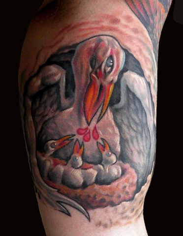 detail on Bron's arm.  Pelican feeding its young from it's own bosom
