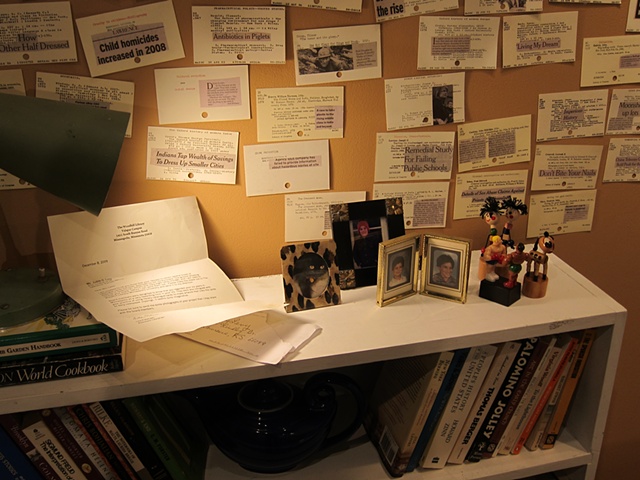library catalogue and newspaper clippings