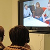 Gallery visitors viewing The Last Descendants: Huckleberry Finn