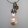 Large Pearl Droplet with Sapphire Rider