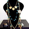 The Abandoned Princess - 
Love heart necklace with pearls glass necklace
Teal pearls and tassels crystal necklace
Peacock cuff
Pearl and brass tassel earrings