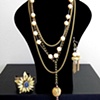 The Abandoned Princess - Tiered chain and pearl vintage necklace
Brass flower cuff
Rhinestone pearl tassel earrings

