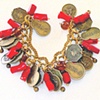 coral and coin charm bracelet