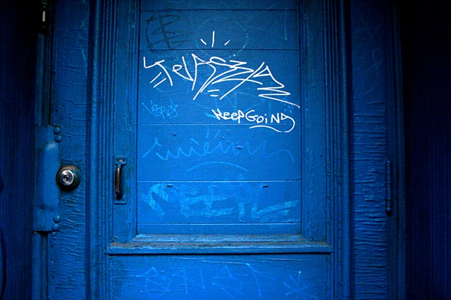 behind the blue door