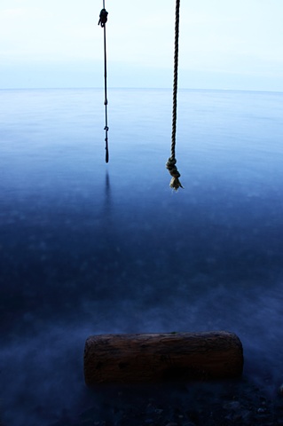 log in slow tide with ropes to the sky