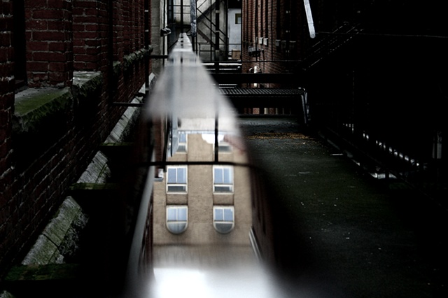 the building in the water on the bannister
