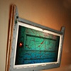 'behind the turquoise door' - behind antique-y window (also)
