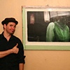 'the brown acid' - in old antique window with artist and thumb