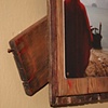 red ghosts and longtail boats (on an old utensil drawer) (DETAIL)