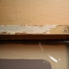 'orange trim' in ol antique window - detail