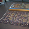 The original rug next to the installation