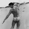 GLENN BISHOP OILED BODY AT LAKE MICHIGAN 1954