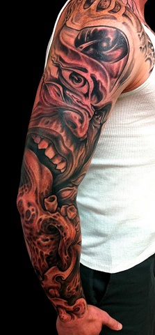 scary black and white tattoo sleeve