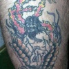 Example of a tattoo by a scratcher at home.