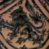 kick ass coat of arms tattoo by paul nolin