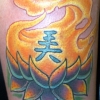 kick ass lotus tattoo by paul nolin