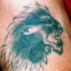 Example of a tattoo by a scratcher at home.