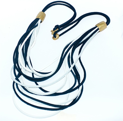 black and white leather and brass necklace
