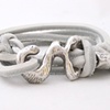 Sterling silver and white leather wrap 