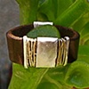 leather, silver and 14k gold wire ring