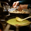 Oma making dinner.