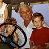 "My Cousins and I on the John Deere with my Papa Talley"