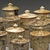 27 covered jars