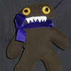 Gingey with purple ribbon