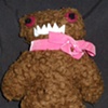 gingey with pink ribbon