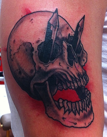 Skull and pencils