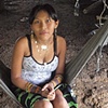 Young Kuna woman sitting on hammock
Darien Jungle