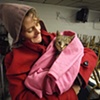 Charlie with Kit Kat in a soup kitchen