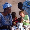 Missionary nurse examining child - Mbaakhe