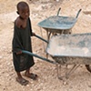 Boy with wheelbarrow