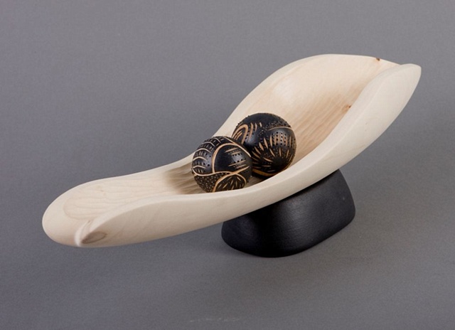 "Two Spheres and a Boat"