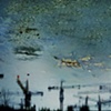 Han Bing, "Urban Amber Series: Red Flags Flying on Skylines Cranes"