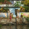 Three Men Bathing, Kerala, India.