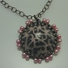 pink pearl scroll necklace