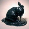 The Tar baby stayed still and Brer Fox, he lay low...