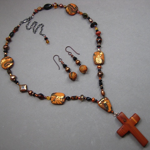 polymer clay beaded necklace with cedar cross